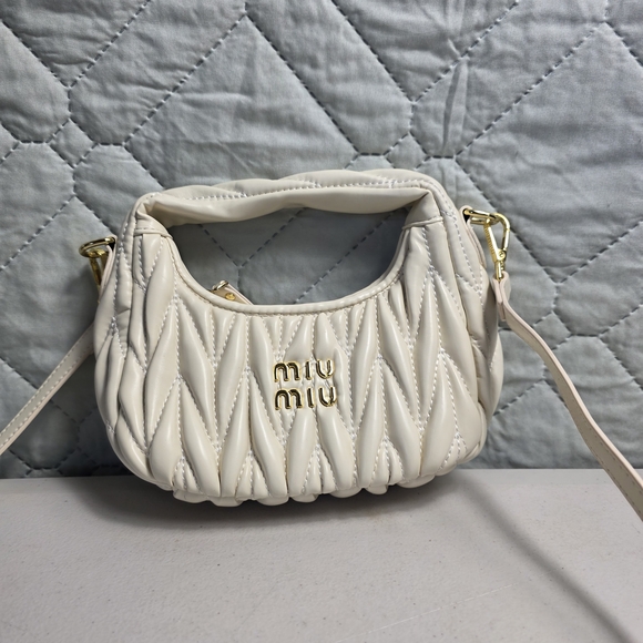 Miu Miu Handbags - MIU MIU Wander Small White Nappa Leather Hobo Bag Nwt
And Authentic